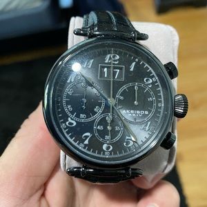 Men’s black watch, leather band.